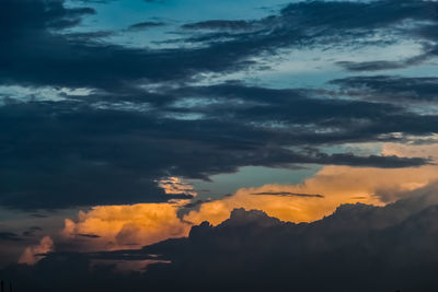 Low angle view of dramatic sky during sunset