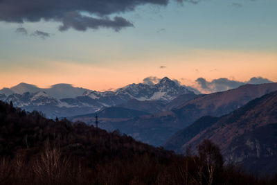 Scenic view of mountains against sky during sunset