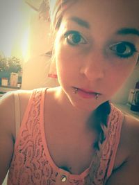 Young woman in dark room