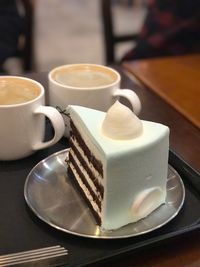 Close-up of coffee served on table