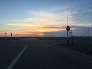 Road against sky during sunset