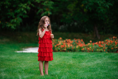 Woman standing on field