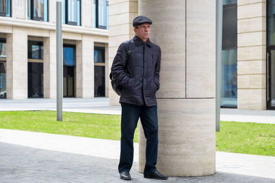 Rear view of man walking on street