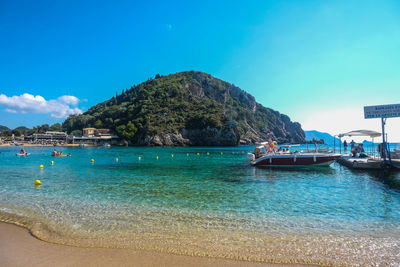  view of the beautiful palaiokastritsa bay, iconic paradise beach, corfu island, greece.