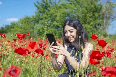 Young woman using mobile phone