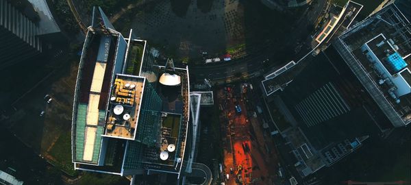 High angle view of illuminated buildings in city