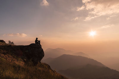 Scenic view of mountains against sky during sunset