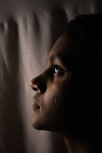 Portrait of young man looking away