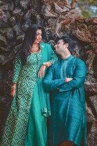 Young couple standing outdoors