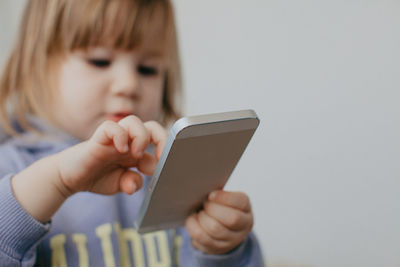 Boy using mobile phone