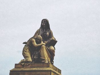 Low angle view of statue against clear sky