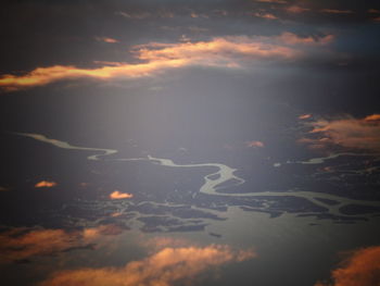 Scenic view of cloudy sky at sunset