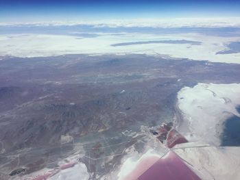 Aerial view of landscape and sea against sky