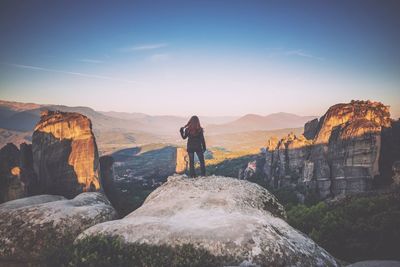 Man standing on rock formation