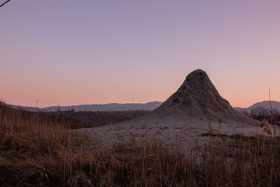 Scenic view of landscape against sky during sunset