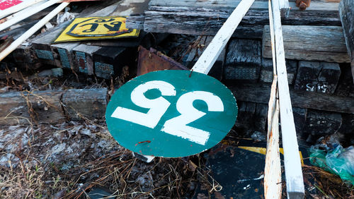 High angle view of arrow sign on road