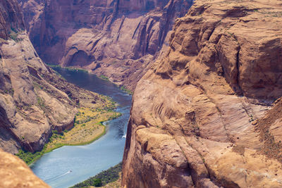 High angle view of river amidst mountains