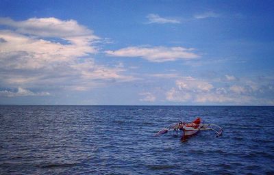 Boat sailing in sea