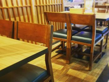 Empty chairs and table in restaurant