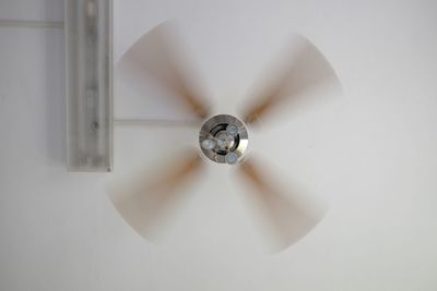 Low angle view of ceiling fan at home