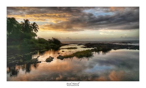 Scenic view of sea against sky at sunset