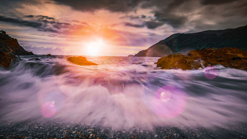 Scenic view of sea against sky during sunset