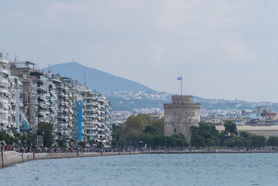 Buildings in city against sky