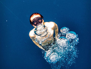 Man swimming in sea