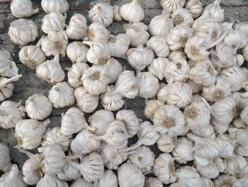 Full frame shot of garlics for sale in market