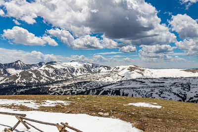 Scenic view of snowcapped mountains against sky