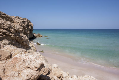 Ocean and beach at the coast of ras al jinz, sultanate of oman.