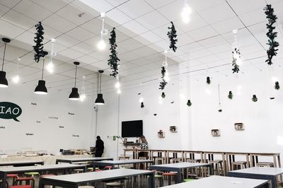 Illuminated lanterns hanging in kitchen