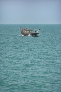 Boat sailing in sea