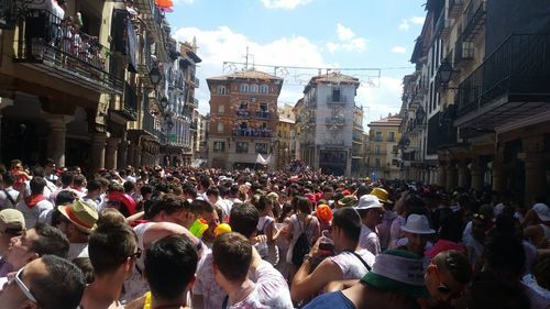 People looking at city street