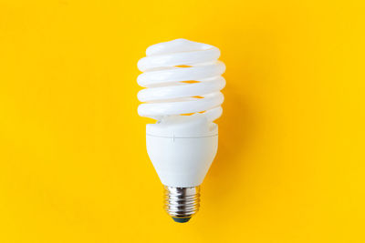 Close-up of illuminated light bulb