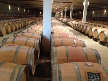 Row of wine bottles in container