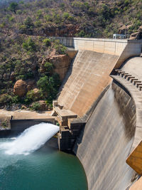 High angle view of dam by river