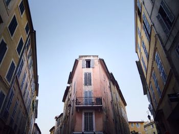 Low angle view of buildings against clear sky