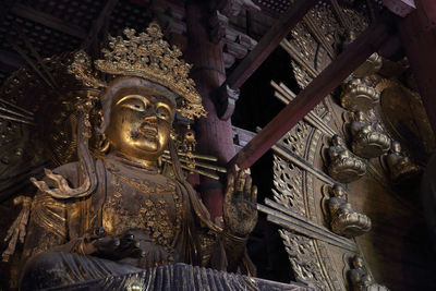 Statue of buddha in building