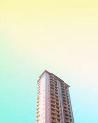 Low angle view of skyscraper against clear sky