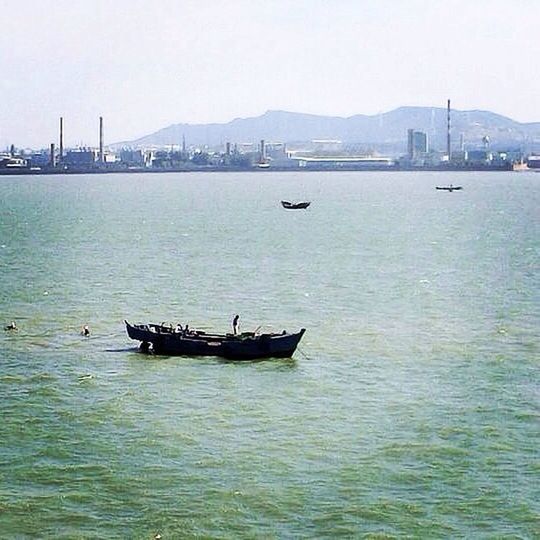 nautical vessel, transportation, water, mode of transport, boat, waterfront, sea, moored, clear sky, mountain, nature, tranquility, built structure, sailing, tranquil scene, sky, rippled, river, copy space, scenics