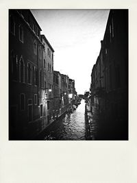 View of canal along buildings