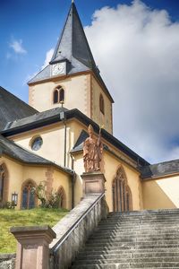 Low angle view of historic building against sky