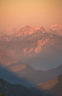 Scenic view of mountains against sky during sunset