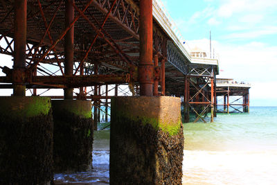 Low angle view of bridge over sea