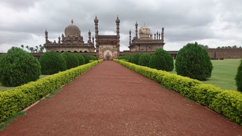 View of tombs against cloudy sky