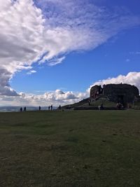 Surface level view of mountain against blue sky