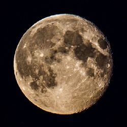 Close-up of moon over black background