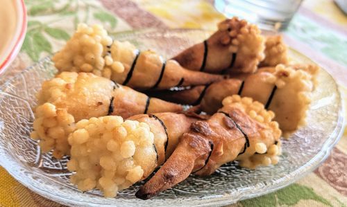 Close-up of snacks in plate on table