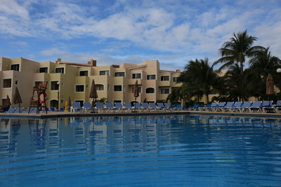 View of swimming pool against blue sky